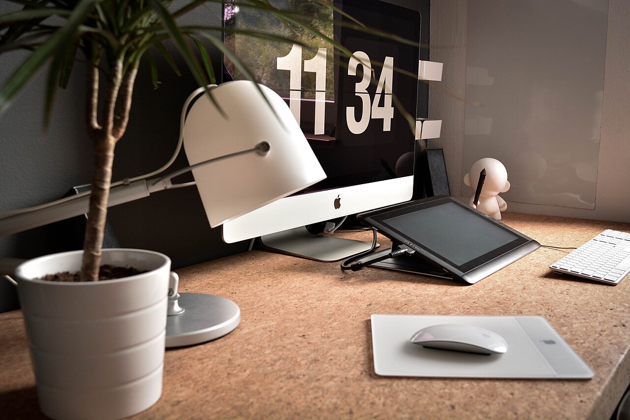 A clean desk workspace with a computer